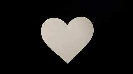 Ivory Paper Heart on a black Background. Romantic Template with Copy Space