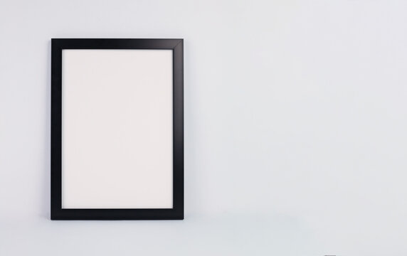 interior and decor. black frame on a white wall.