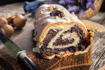 Poppy seed strudel with icing.