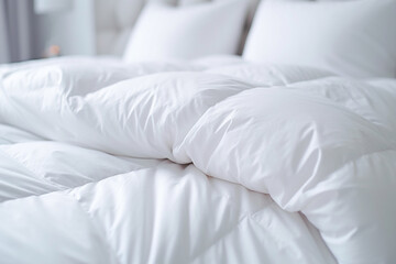 white duvet lying on the background of the headboard with pillows,close-up,the concept of preparing for the winter season,household chores,comfort in the house,hotel and home textiles - obrazy, fototapety, plakaty