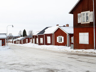 Typical Nordic houses in a snowy village in Sweden