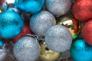 multi-colored Christmas tree decorations as a background 1