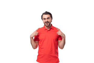 young confident handsome european brunette man with beard dressed in red t-shirt with fabric print mockup