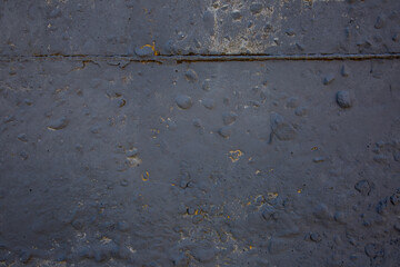 Texture of an old purple shabby wall
