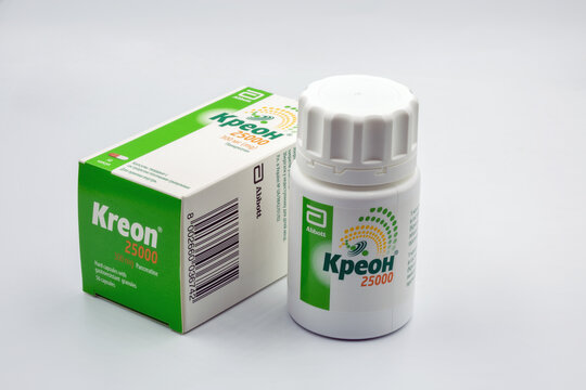 Creon pancreatin pack closeup against white.
