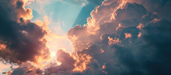 Pink sunlight penetrates clouds.