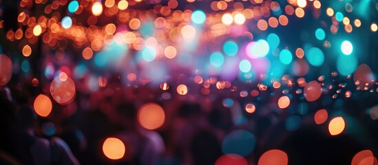 Create a blurry and defocused texture. Illuminate colored lights during a concert with artists...
