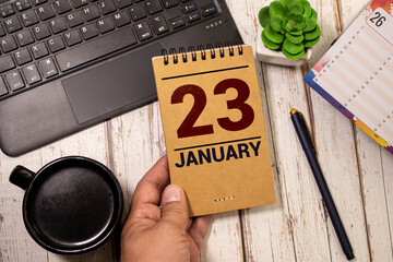 January 23rd.January 23 white wooden calendar on wood background. Copyspace for your text. - obrazy, fototapety, plakaty