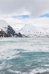 Ice sheets covering Portage Lake, from the Begich Boggs Visitor Center with Bard Peak in the distance, Alaska, USA