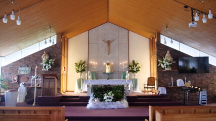 shot of religious Christian or catholic chapel and altar for worshippers
 - obrazy, fototapety, plakaty