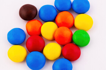 Handful Of Colorful Candies On Light Background