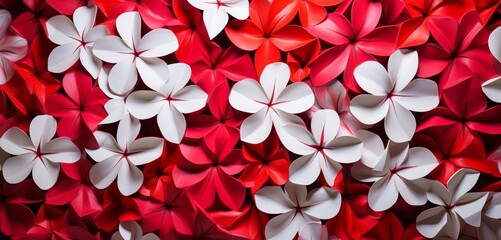 Vibrant tropical floral pattern showcasing red lobelias and white phlox on a hexagonal 3D wall texture - obrazy, fototapety, plakaty