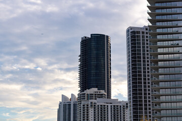 Fototapeta na wymiar Miami Beach at sunset, beaches, sand, water and buildings