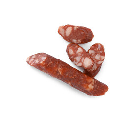 Thin dry smoked sausages isolated on white, top view