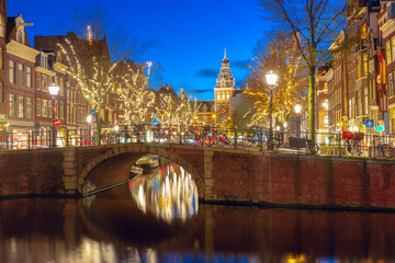 Fototapeta na wymiar Night Amsterdam canal Spiegelgracht with typical dutch houses, Holland, Netherlands.