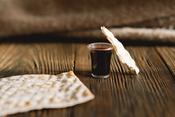 Communion. Religious tradition of breaking bread. Bread and wine as a sign of memory of Christ's sacrifice. - obrazy, fototapety, plakaty