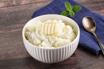 Fototapeta na wymiar Homemade rice porridge with butter