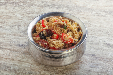 Arabic cous cous with meat and tomato