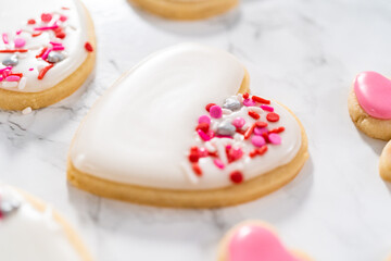 Heart-shaped sugar cookies with royal icing