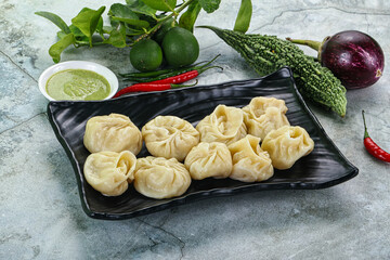 Nepali steamed dumplings  Momo with sause