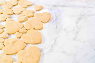 Heart-shaped sugar cookies with royal icing