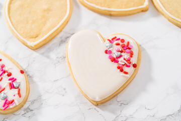 Heart-shaped sugar cookies with royal icing