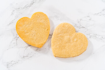 Heart-shaped sugar cookies with royal icing
