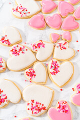Heart-shaped sugar cookies with royal icing