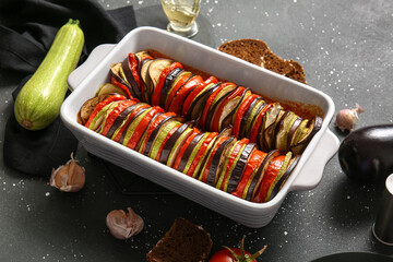 Baking dish of tasty Ratatouille on black background