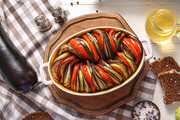 Baking dish of tasty Ratatouille on table