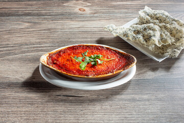 A view of a Vietnamese baked seafood entree called hai san dut lo.