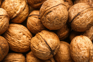 Tasty walnuts as background, closeup