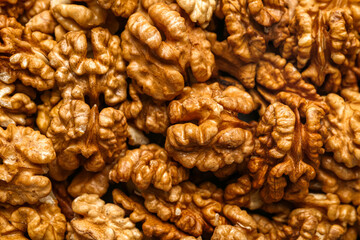 Tasty shelled walnuts as background