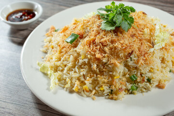 A closeup view of an entree of salted fish fried rice.