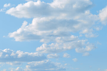 Blue sky with white clouds, tranquil blue trend color, pastel colored cloudscape. Fluffy heaven pattern. Beautiful Cloudy background, nature environment backdrop, wallpaper, screensaver