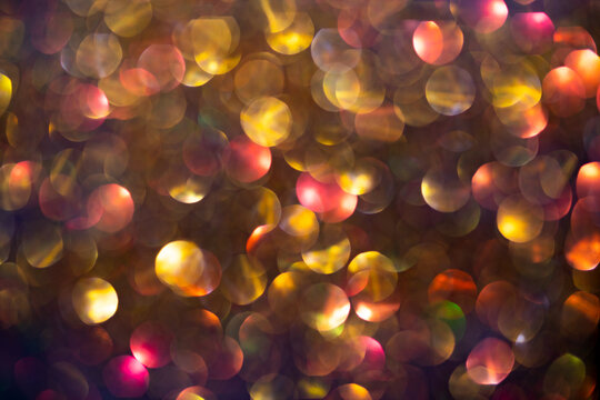 Light blur bokeh, defocused background. Festive abstract background with bokeh, defocused lights. Festive twinkle lights background, abstract sparkle backdrop design. Light backdrop with glow effect.