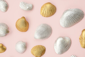 Shined cockle shells collection on pink.