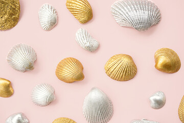 Shined cockle shells collection on pink.