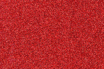Red glitter texture background. christmas background.