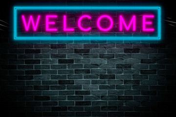 Fototapeta premium Welcome with copy space neon banner on brick wall background.