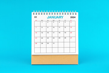 January 2024, Monthly desk calendar for 2024 year on Blue background.