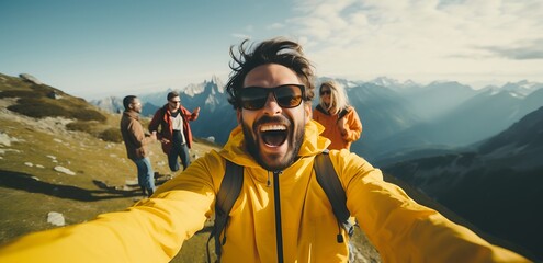 Joyful Man taking a selfie in the mountain. landscape view