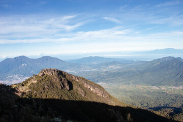 the beauty of the view at the top of a mountain in a tropical area is like a country above the clouds. a view presented when climbing an Indonesian mountain.