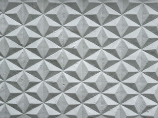 Patterned white concrete fence as background. Texture