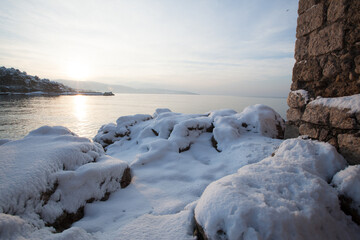 Winter's Embrace: Krk Town Draped in Snow's Elegance