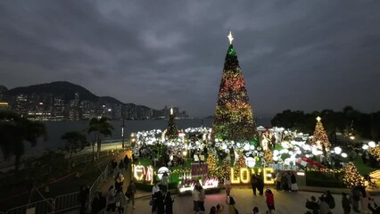 Dec 21 2023 Festive illuminated tree, decorated with Christmas ornaments at night