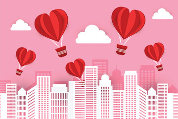 Heart shape hot air balloon flying over cityscape. Creative valentines day background