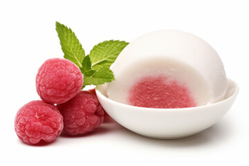 Close up of a fresh delicious Mochi in ceramic bowl with raspberries and mint leaves, on a white...