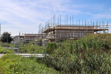 New construction of a house in Esse Zoom with scaffold and isolation in Nieuwerkerk