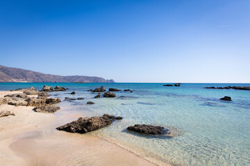 Fototapeta na wymiar Elafonisi beach in Crete, Greece. Crystal clear sea water and blue sky.